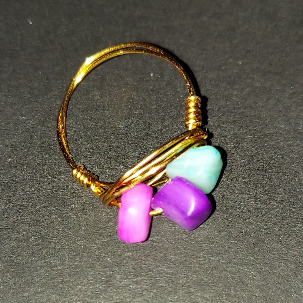 gold ring with multi color stones
